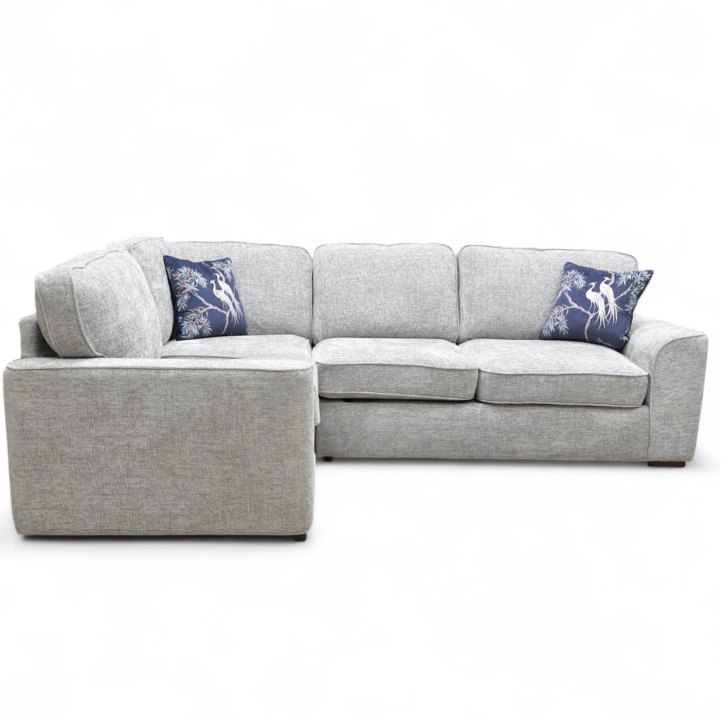 The 'Emilia' LHF Corner Sofa Bed fully converted into a comfortable pull-out bed, showing the sleeping surface.