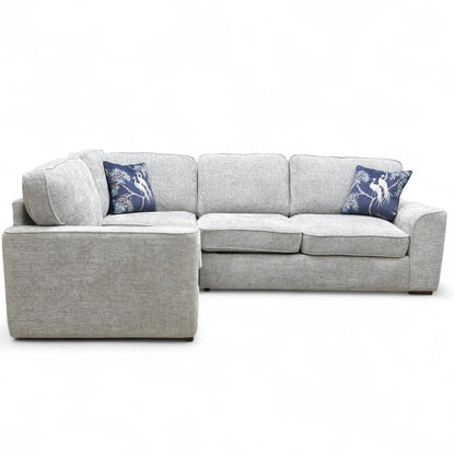 The 'Emilia' LHF Corner Sofa Bed fully converted into a comfortable pull-out bed, showing the sleeping surface.