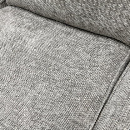 Close-up of the silver woven fabric, showing the fine texture and color of the 'Emilia' Corner Sofa Bed upholstery.