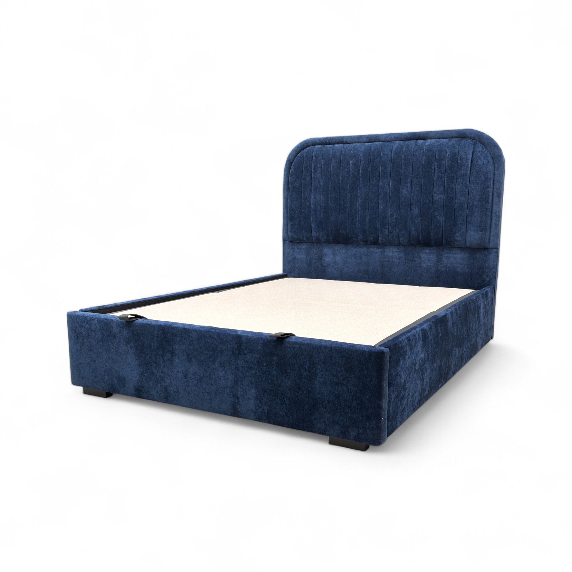 Angled view of the 'Portland' bed, showing the clean edges and the solid color of the sapphire fabric.