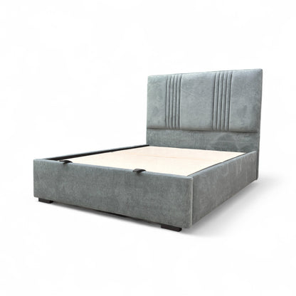 Side view of the King-size 'Oasis' bed frame, emphasizing the overall height of the headboard and the upholstered base.