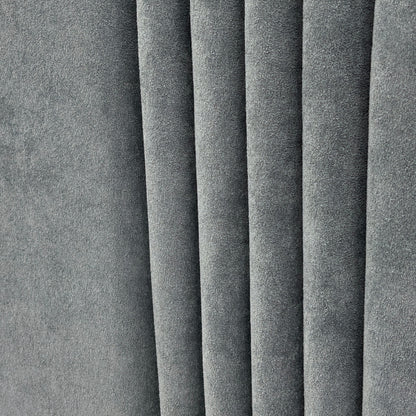 Close-up of the 'Oasis' Floor Standing Headboard, showcasing the deep vertical channel stitching and the sheen of the Milan Petrol Velvet fabric.