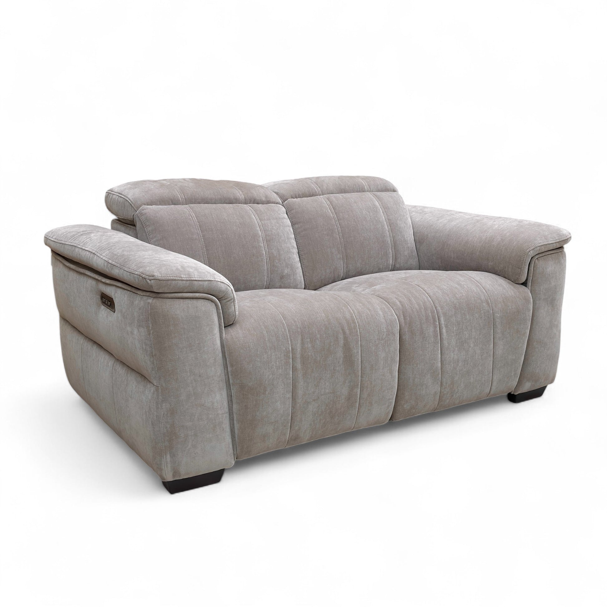 The 'Inca' 2 Seater Sofa with the right seat reclined and the headrest tilted, demonstrating independent relaxation settings.
