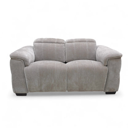 Front-on view of the 'Inca' 2 Seater Power Recliner Sofa, emphasizing its pocket-sprung seats and comfortable, roomy proportions.