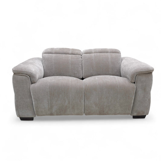 Front-on view of the 'Inca' 2 Seater Power Recliner Sofa, emphasizing its pocket-sprung seats and comfortable, roomy proportions.