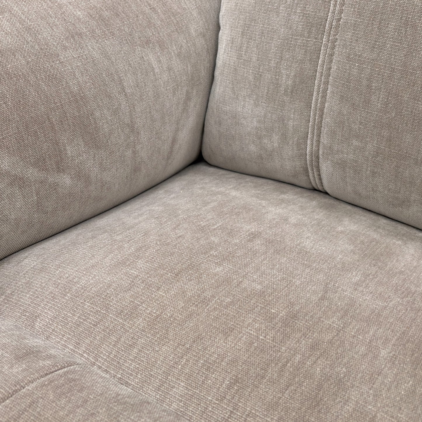 Close-up view of the Nutmeg 58005 linen fabric upholstery, showing the texture and weave detail.