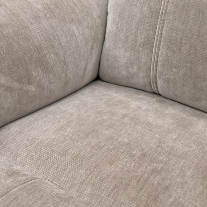 Close-up view of the Nutmeg 58005 linen fabric upholstery, showing the texture and weave detail.