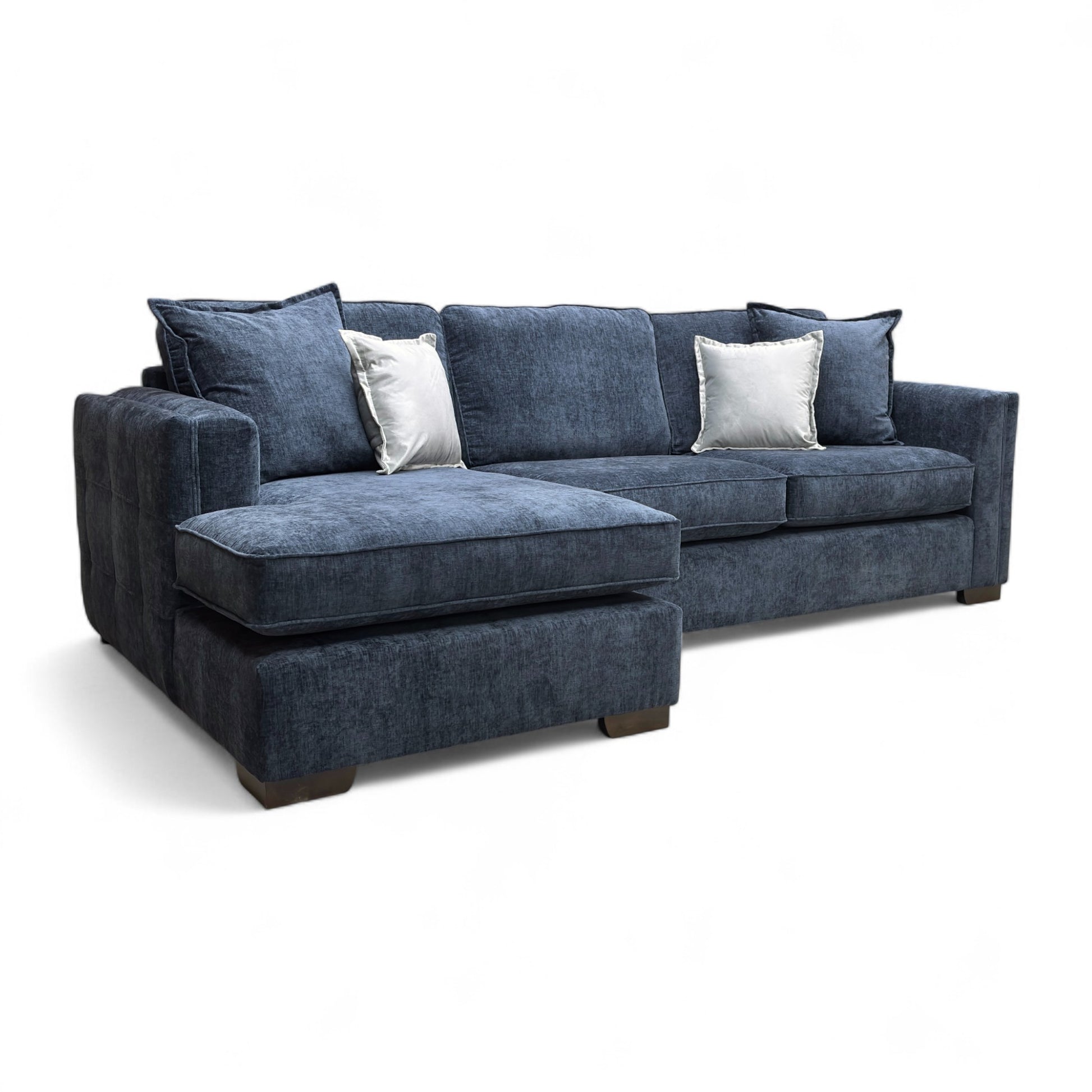 Full, straight-on view of the large 'Chelsea' left-hand facing open-end corner chaise sofa, upholstered in navy blue Paso Chenille fabric.