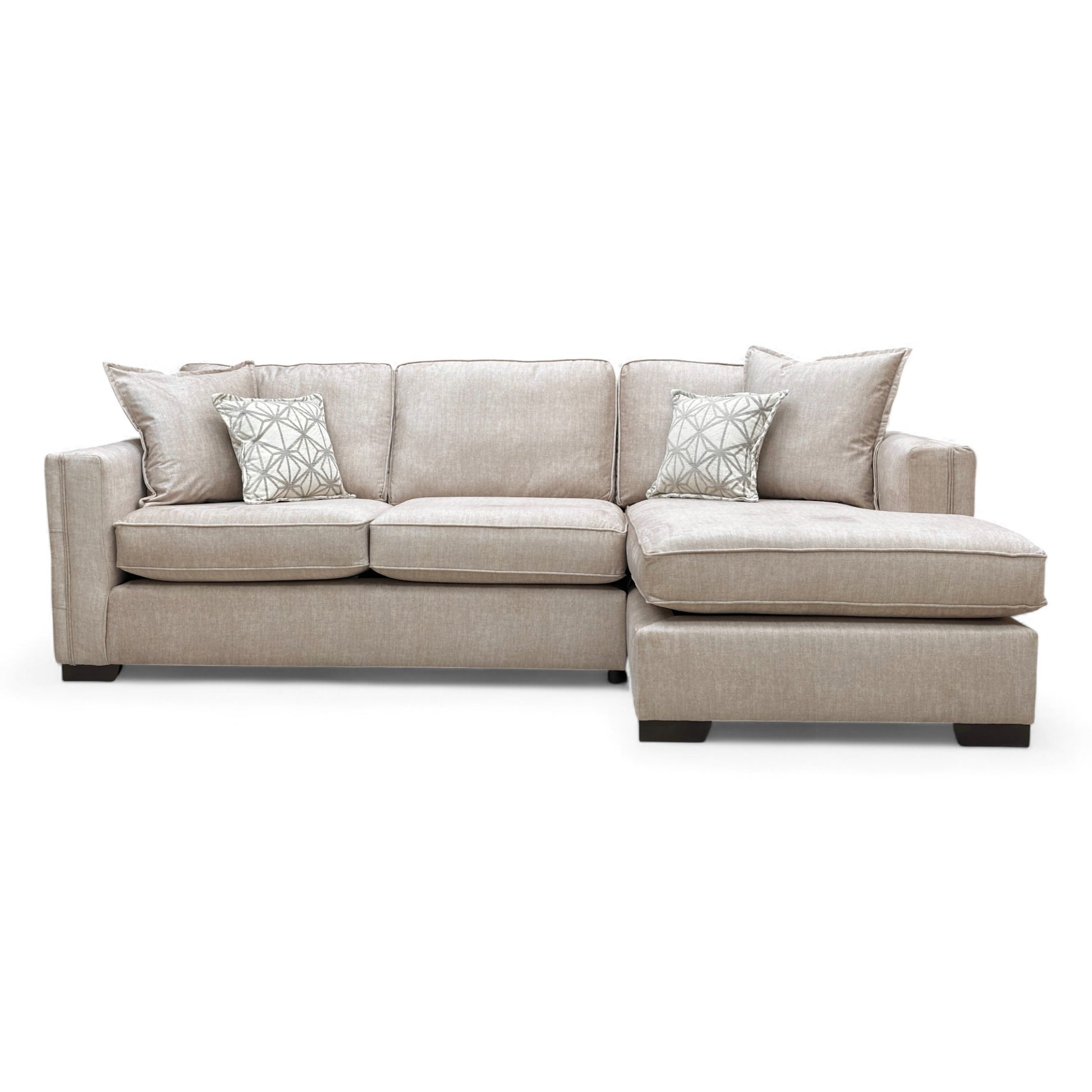 Angled view of the 'Chelsea' chaise, emphasizing the velvet texture, deep seating, and the right-hand open end.