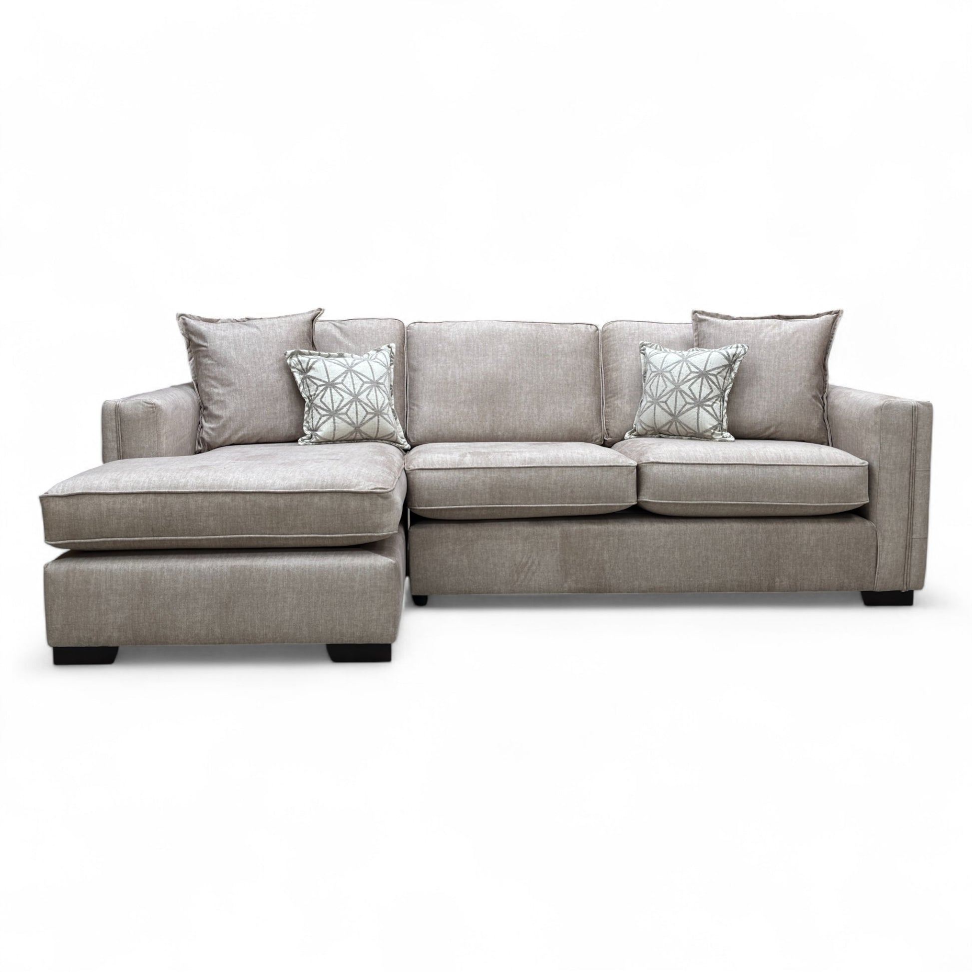 Beige velvet 'Chelsea' sofa with chaise, modern design, comfortable cushions, perfect for contemporary living spaces.