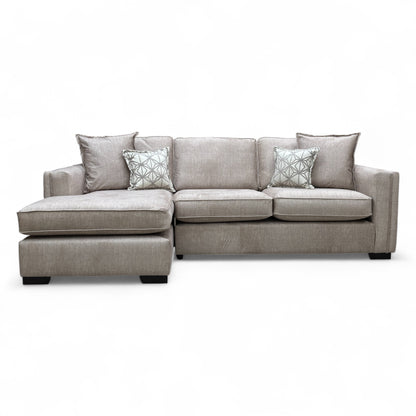 Beige velvet 'Chelsea' sofa with chaise, modern design, comfortable cushions, perfect for contemporary living spaces.