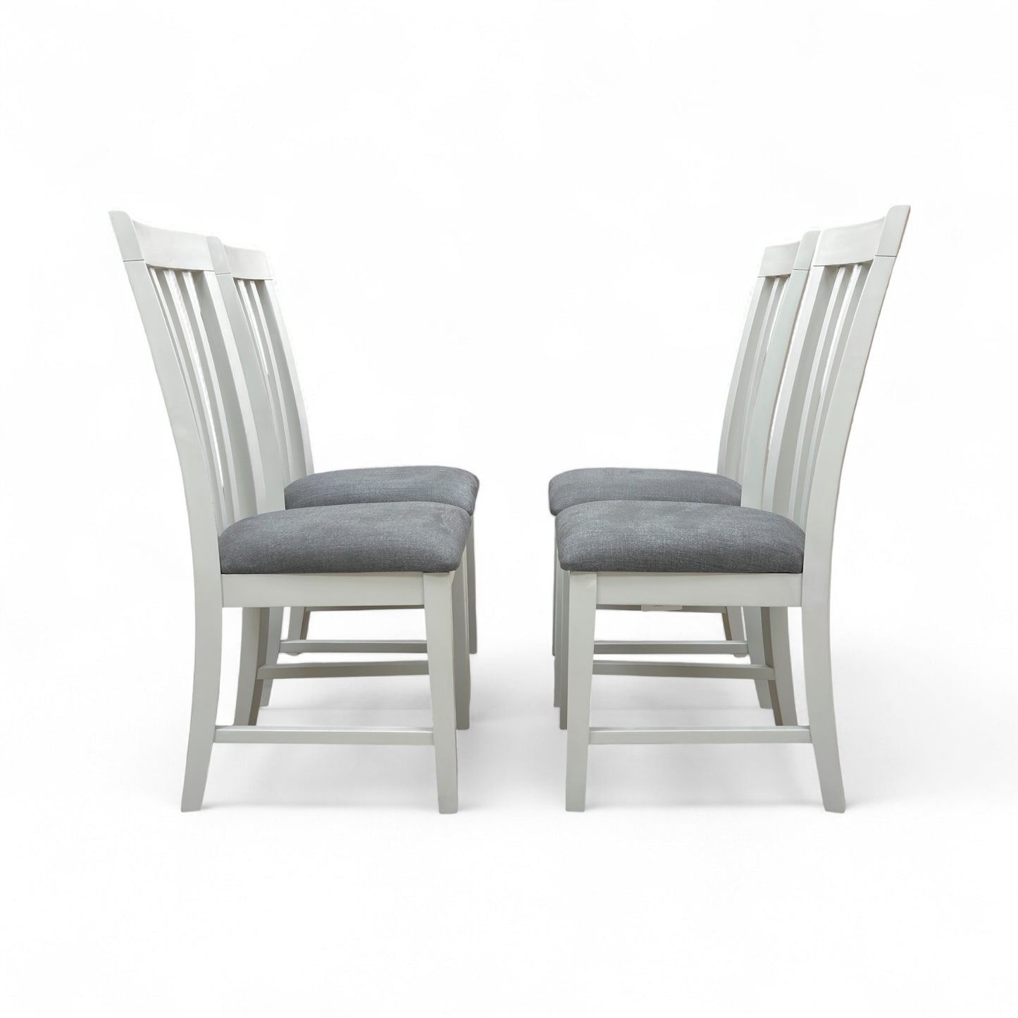 Angled view of the Hamilton grey wooden chair set, showing two chairs placed side-by-side, highlighting the craftsmanship and painted finish.
