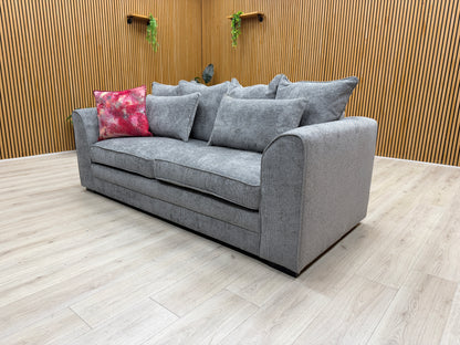 Lifestyle view of the Soho 3-seater sofa in a living room setting, showcasing its modern aesthetic and neutral grey tones.