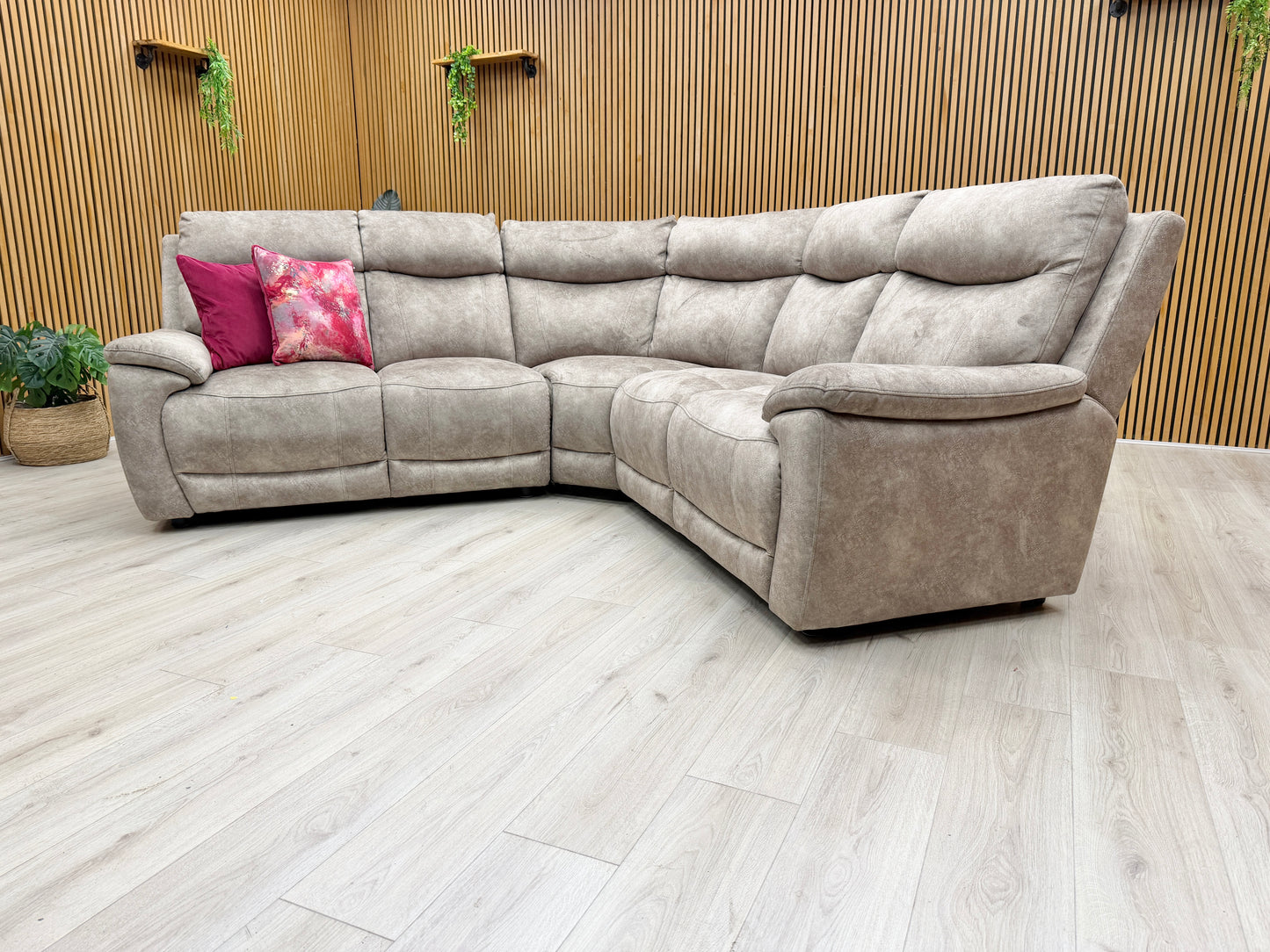 Front-facing view of the Sloane sectional, highlighting the plush back cushions and wide seating areas designed for family lounging