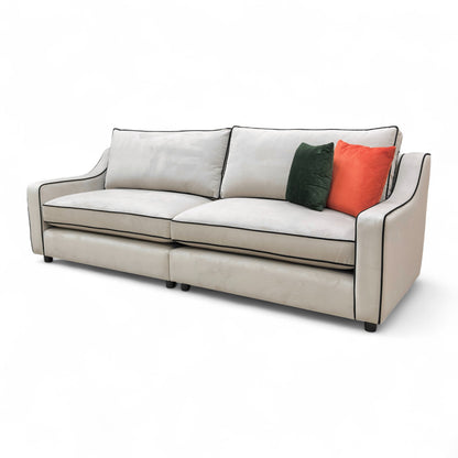 Detail image showing the damage on the sofa, a specific condition note for this outlet product.