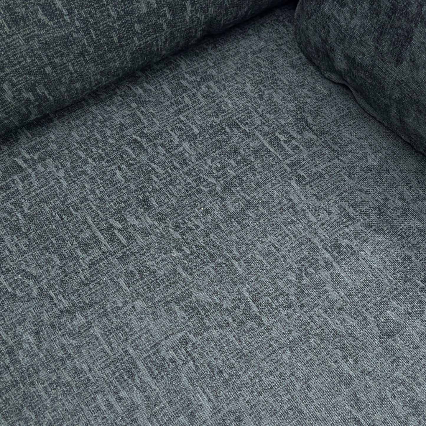 Close-up detail of the charcoal grey linen fabric upholstery on the 'Chalfont' sofa, showing the weave and texture of the material.