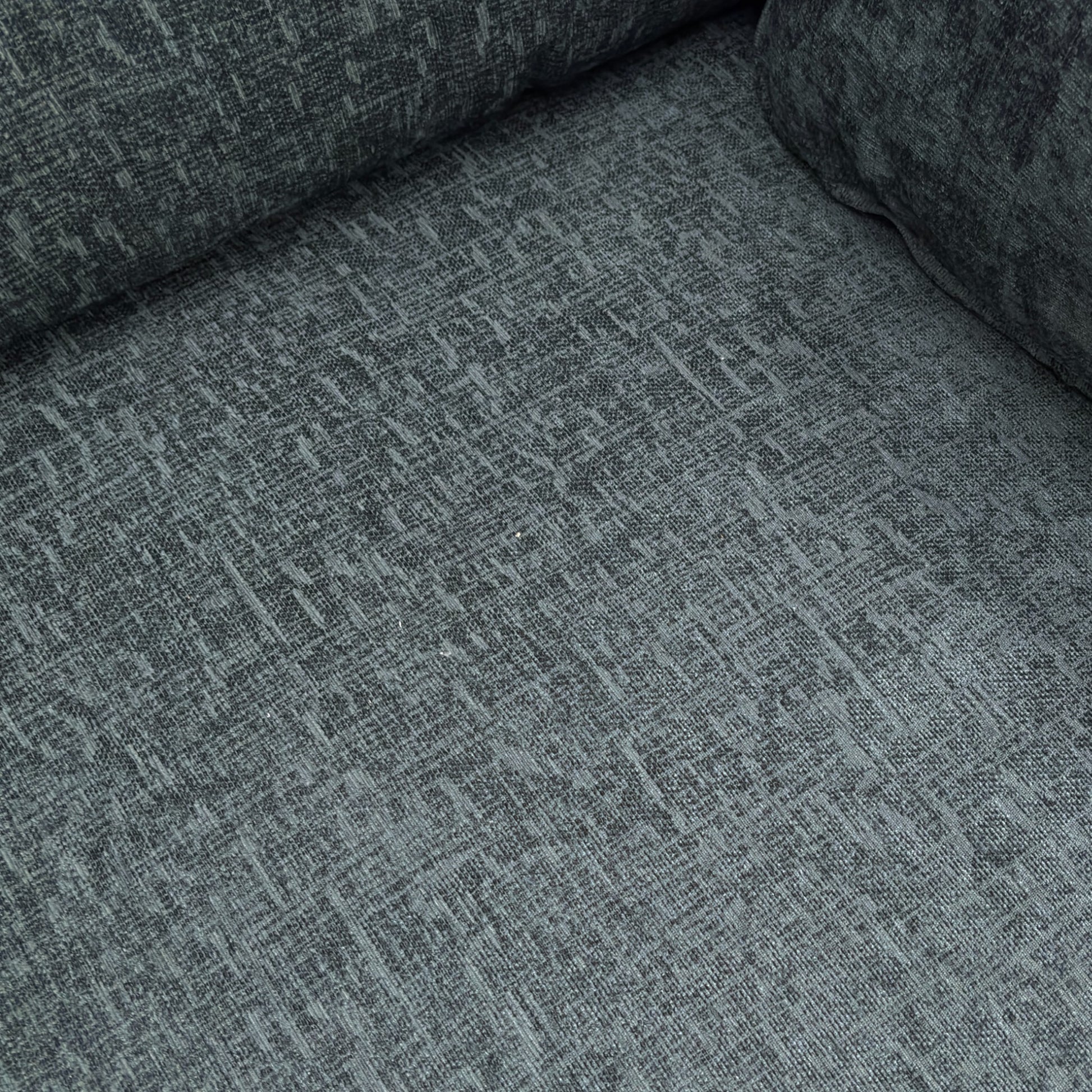 Close-up detail of the charcoal grey linen fabric upholstery on the 'Chalfont' sofa, showing the weave and texture of the material.
