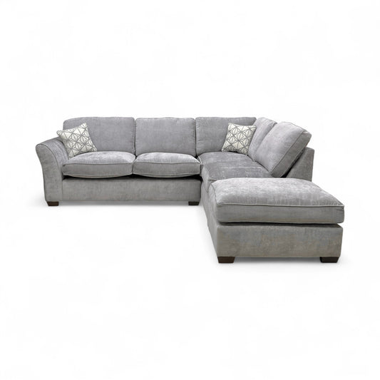 Frontal view of the ‘Rosie’ sofa, showing the corner section, two seating areas, and the chaise lounge.