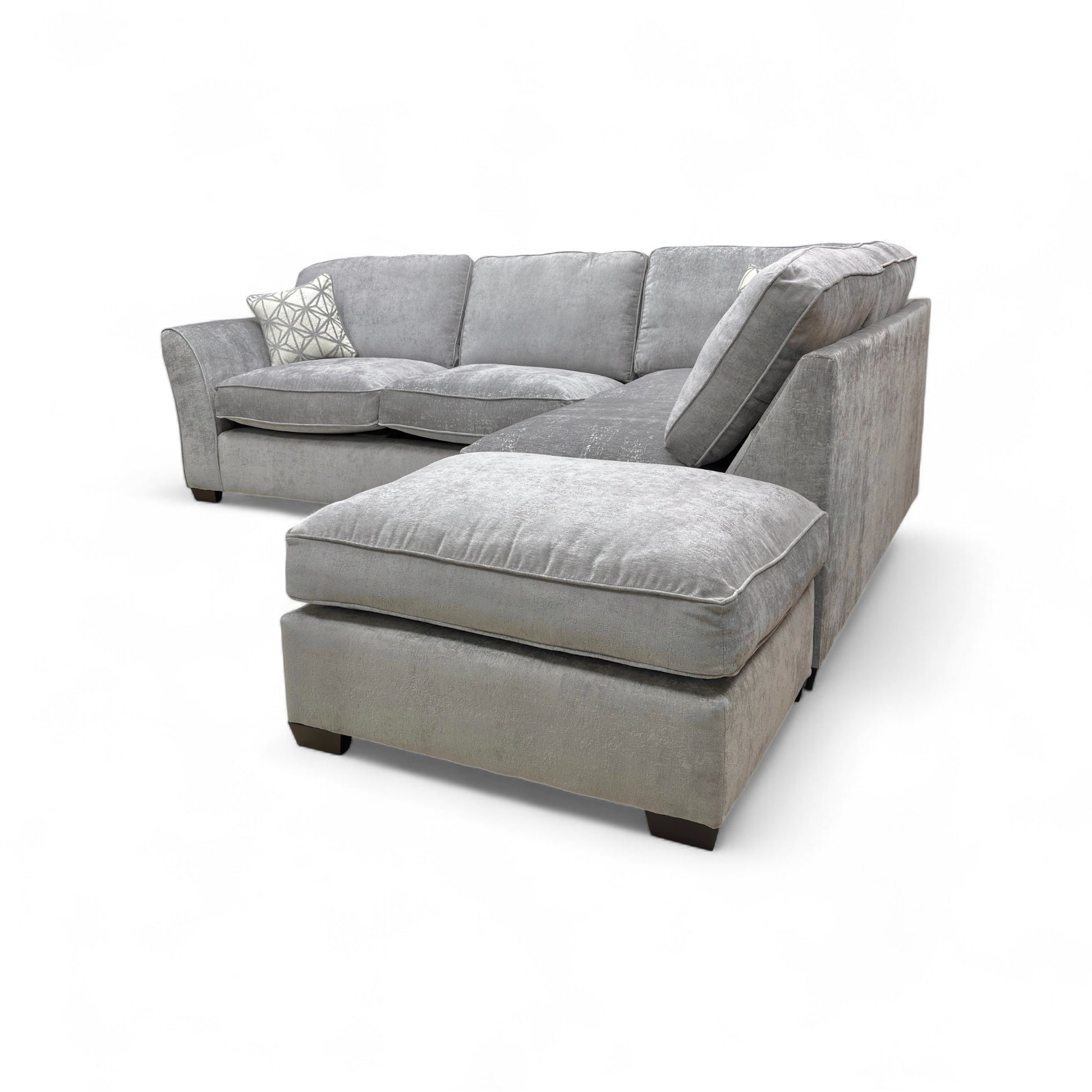 Detail shot showing the armrest, cushioning, and the contemporary wooden feet.