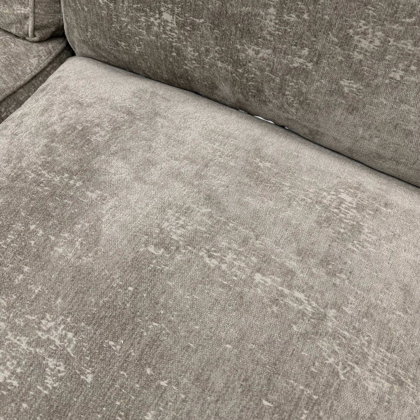 Close-up texture detail of the Meridian Truffle Chenille fabric upholstery on the ‘Rosie’ sofa.