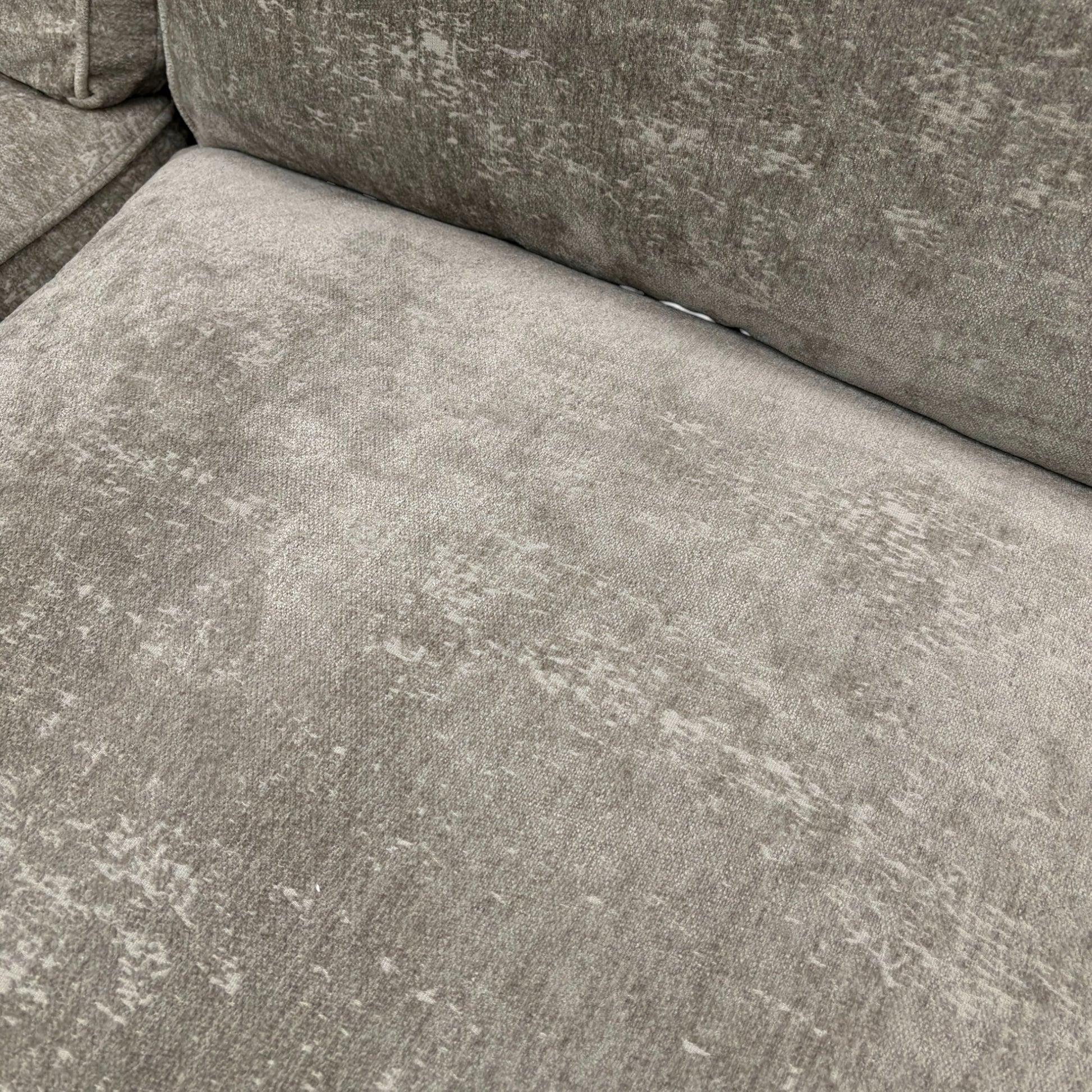 Close-up texture detail of the Meridian Truffle Chenille fabric upholstery on the ‘Rosie’ sofa.