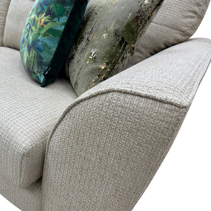 A close-up shot focusing on the texture of the Wheat Plain fabric and the seat cushion details.