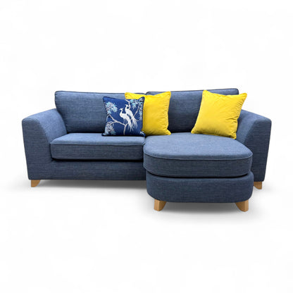 A different angled perspective of the entire sofa in a room setting.