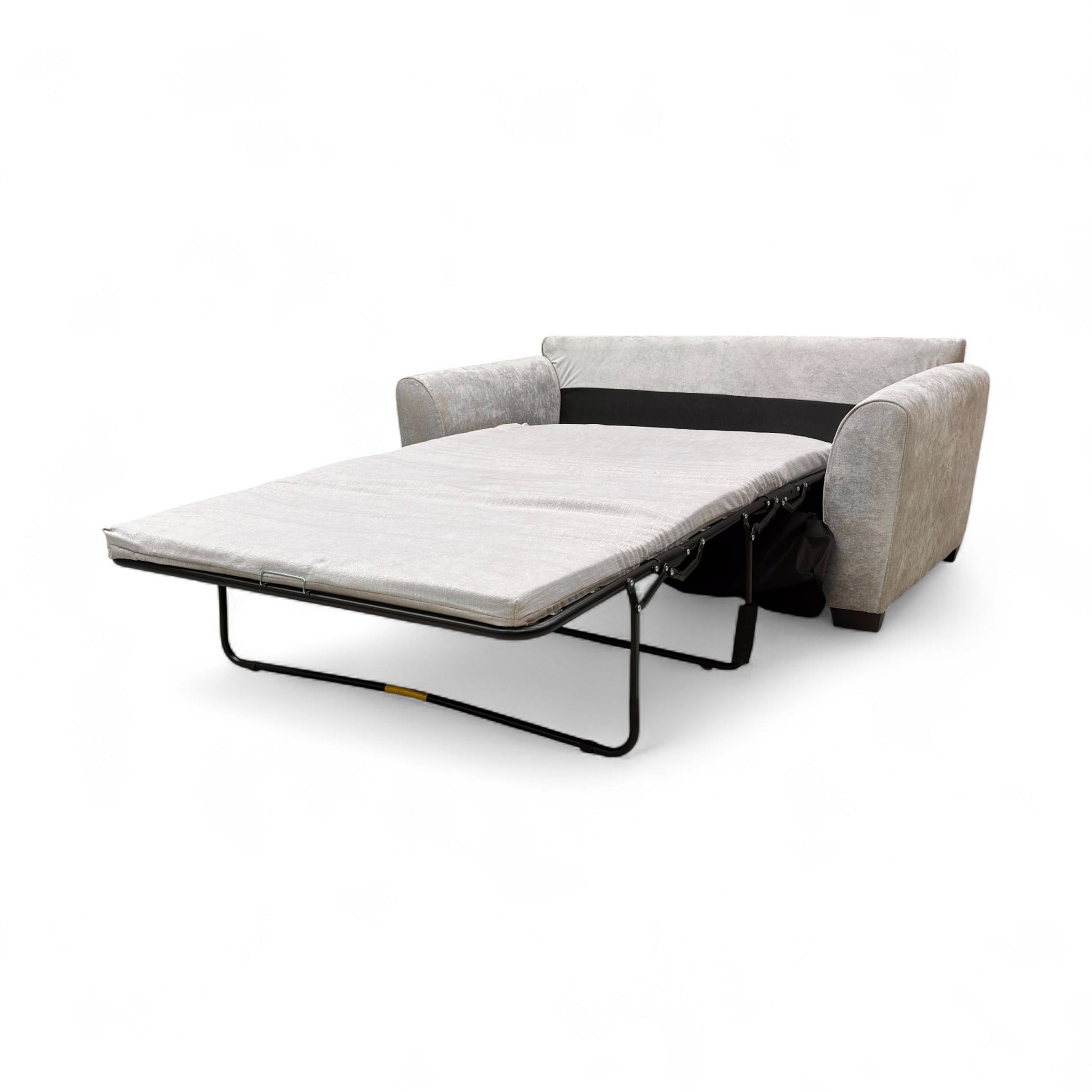 Side profile view of the ‘Julius’ sofa in its upright position, showing the depth and simple, modern wooden legs.