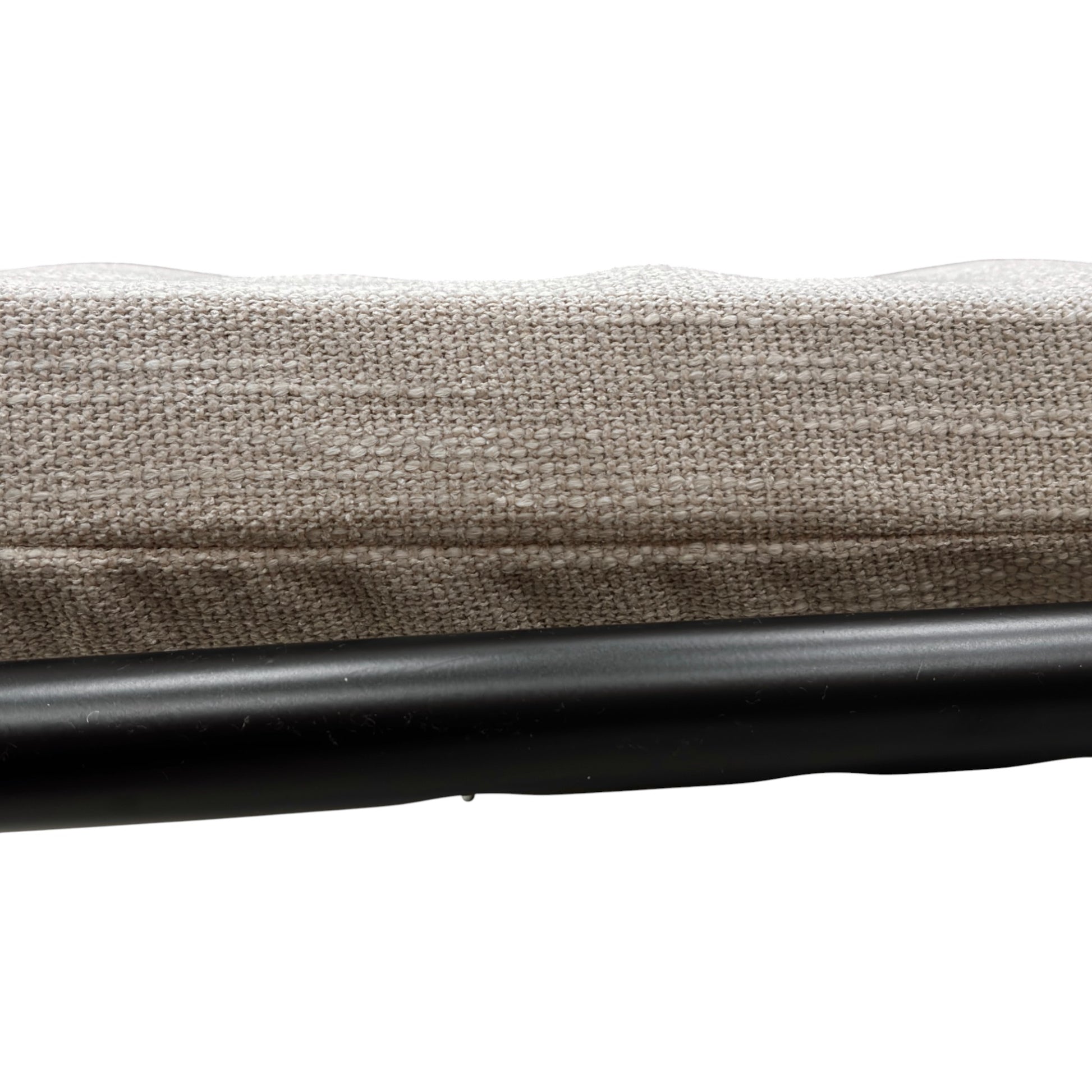 Close-up of the fully extended sofa bed mattress and the exposed metal support frame.