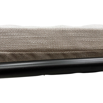 Close-up of the fully extended sofa bed mattress and the exposed metal support frame.