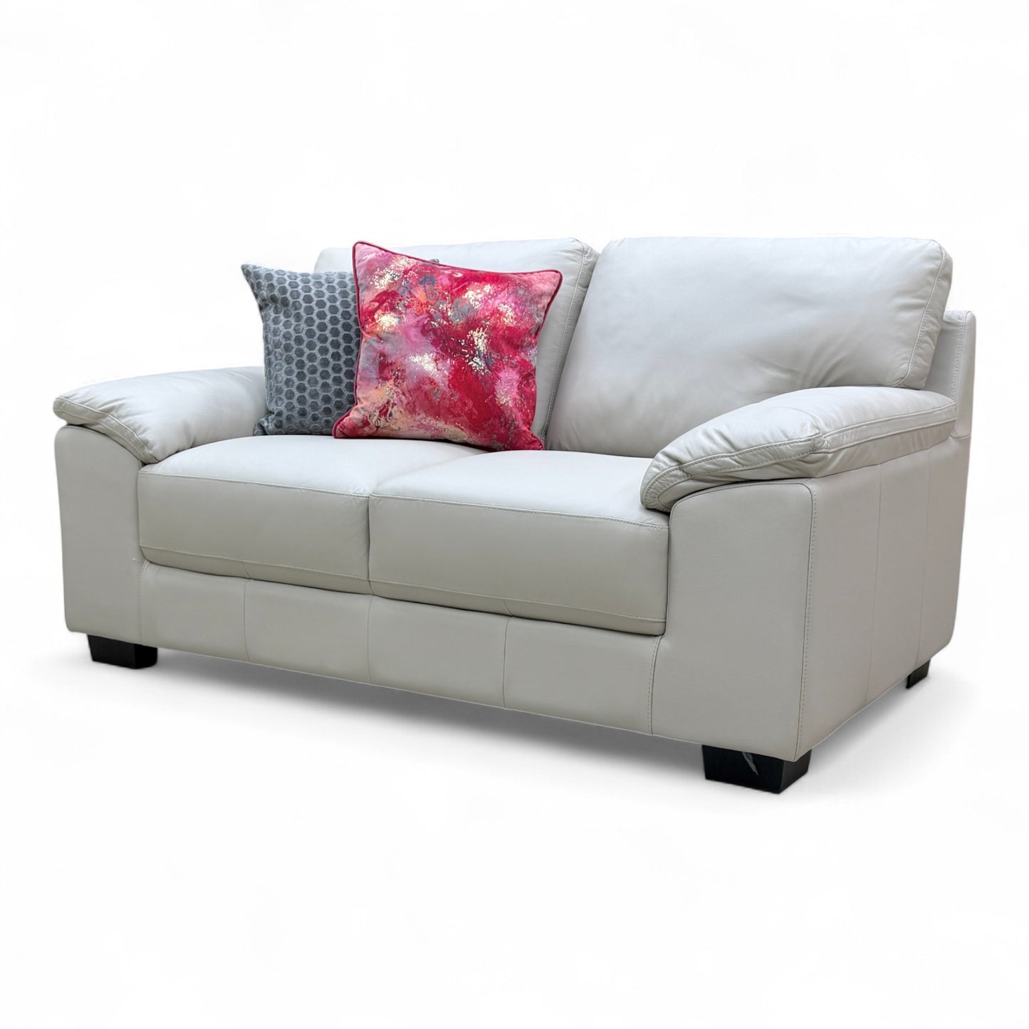 Side profile view of the 'Hofman' sofa, emphasizing the low armrests and depth of the seating.