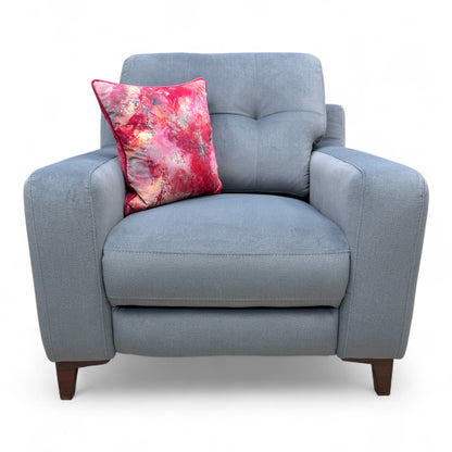 Frontal view of the 'Iris' steel grey velvet power recliner armchair in the upright position, showing its contemporary design.