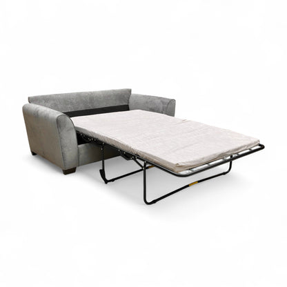 The ‘Julius’ Sofa Bed fully extended into the sleeping position, showing the pull-out double-sized mattress and bed frame.