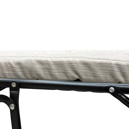 Close-up of the inner pull-out mattress and the metal frame mechanism of the sofa bed.