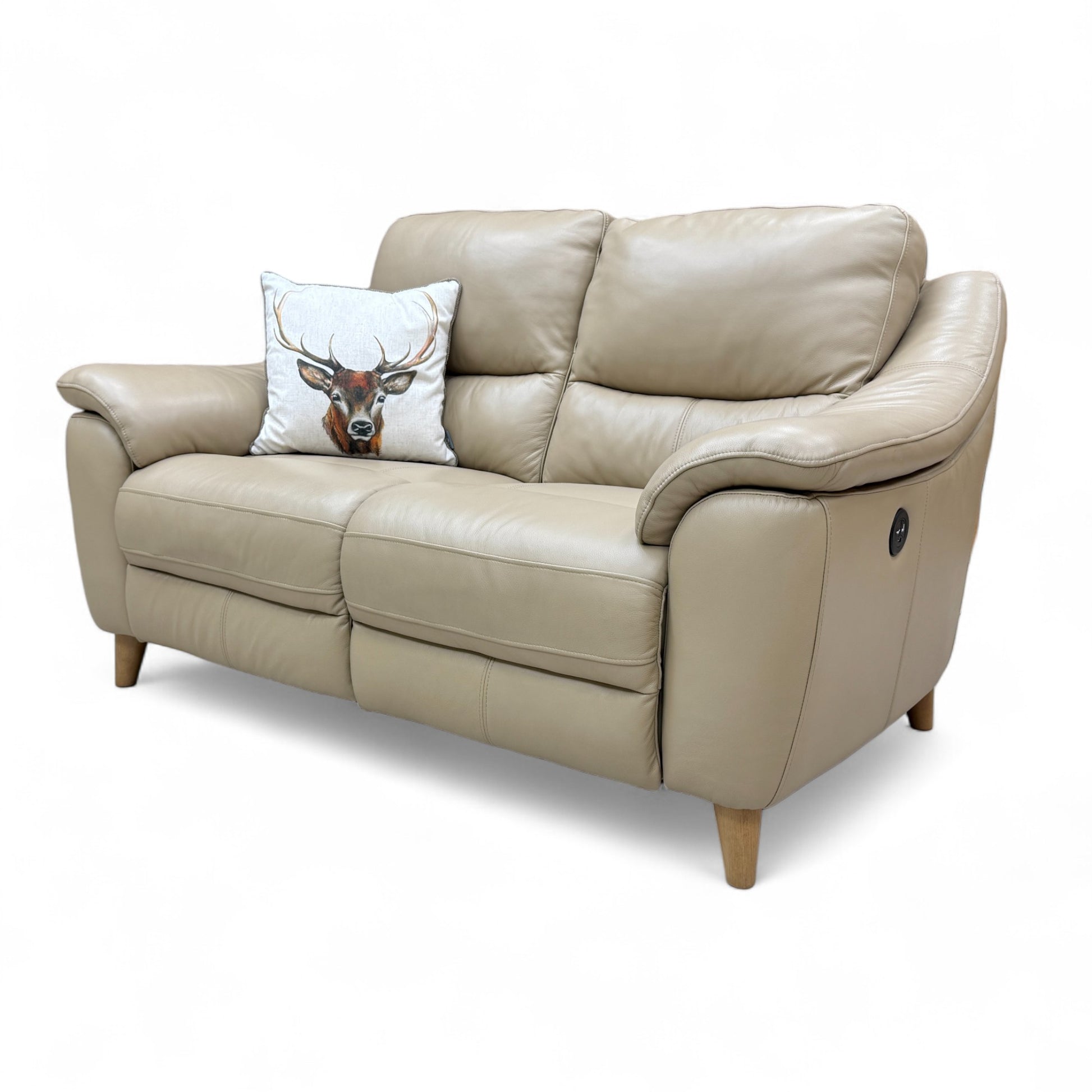 Detail shot of the thick, padded armrest and stitching on the cream leather upholstery of the 'Francis' power recliner sofa.