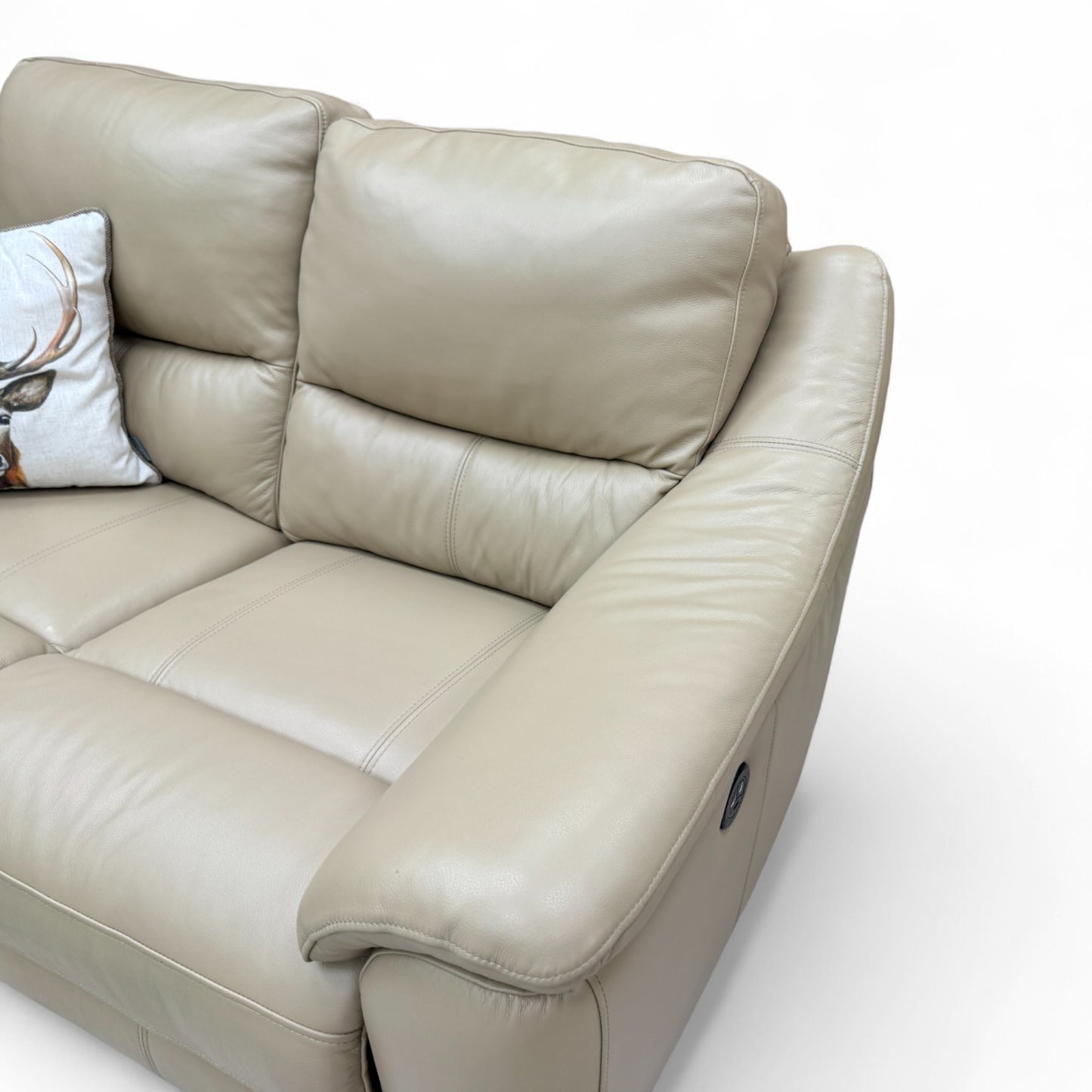 Close-up view of the back and seat cushions of the 'Francis' sofa, highlighting the foam fill and cream leather texture.