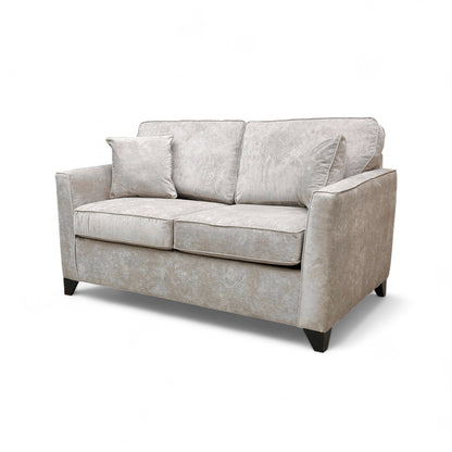 View showing the two main seat cushions of the sofa, emphasizing the cushion thickness.