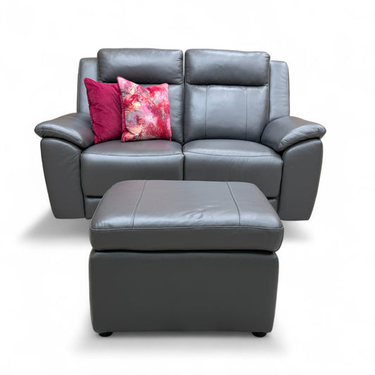 Full front view of the 'Maverick' 2-seater sofa, highlighting the reclining action with one side fully extended.