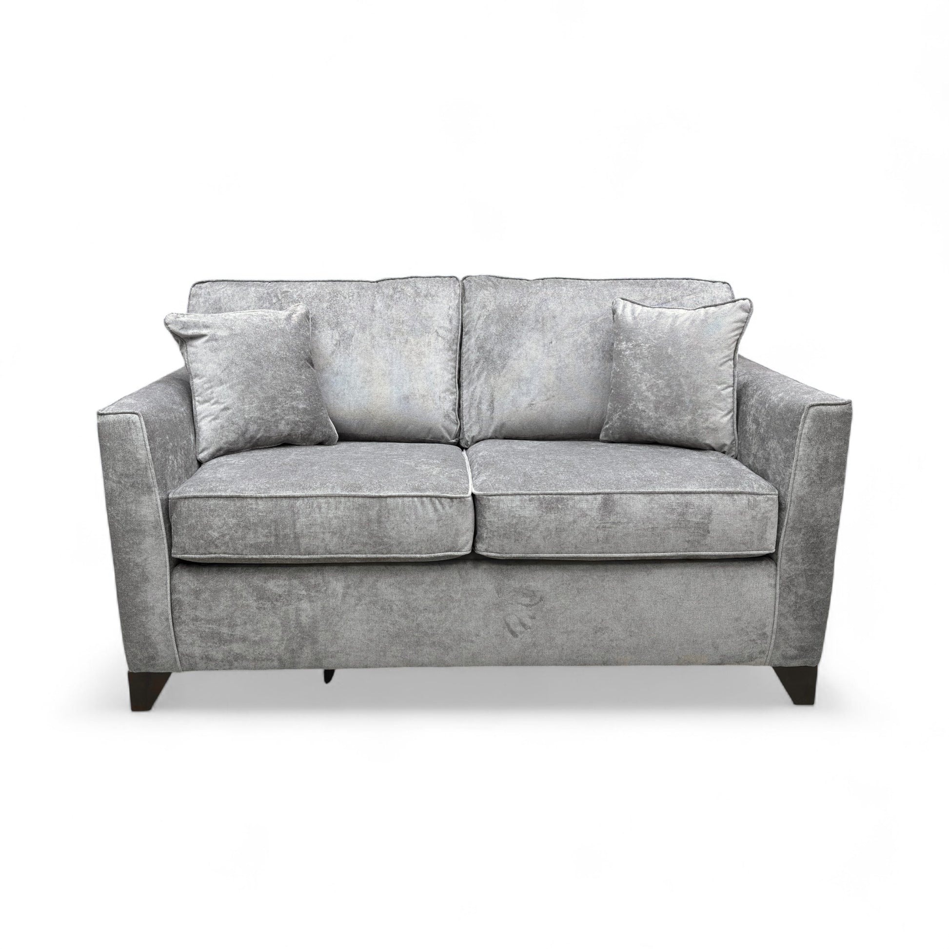 Frontal view of the ‘Smith’ Grey Fabric Sofa, emphasizing the size, armrests, and seat cushions.