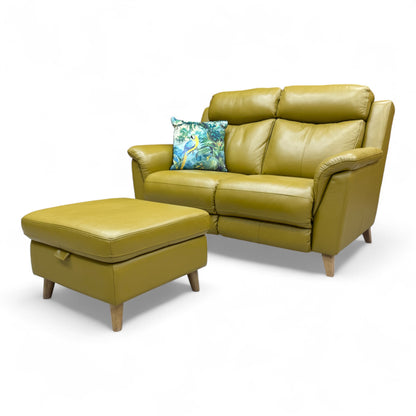 Angled view of the Fabb 'Sienna' 2-seater sofa and small storage footstool, highlighting the bright mustard yellow leather upholstery.