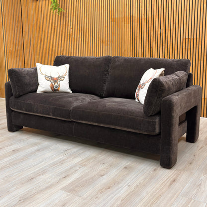 Detailed view focusing on the deep seat cushions and the plush back cushions of the dark chocolate chenille sofa.