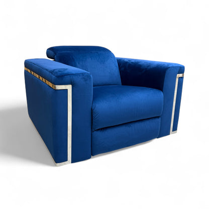 Side profile view of the 'Cora' Royal Blue Velvet Power Recliner Armchair, with the footrest fully extended in the reclined position.