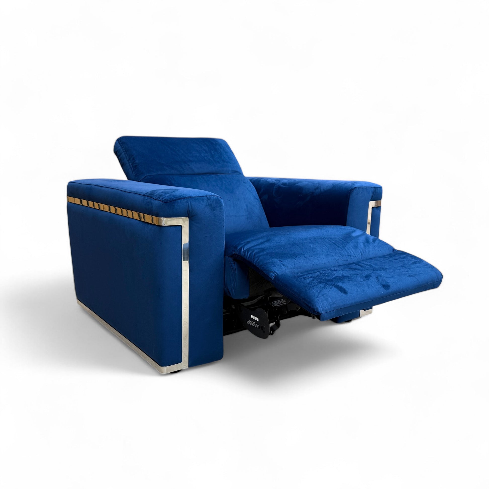 Angled view of the 'Cora' Armchair, highlighting the modern English arm style and rich royal blue velvet upholstery.