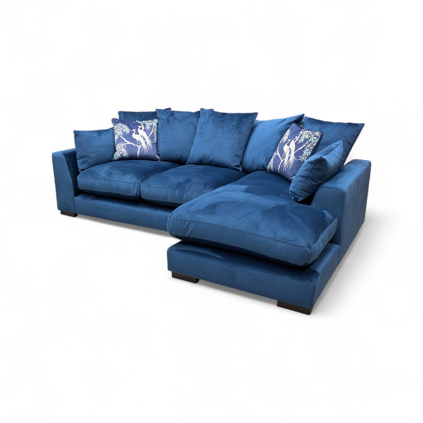 Detail shot showing the armrest, seat cushion, and the low-profile feet.