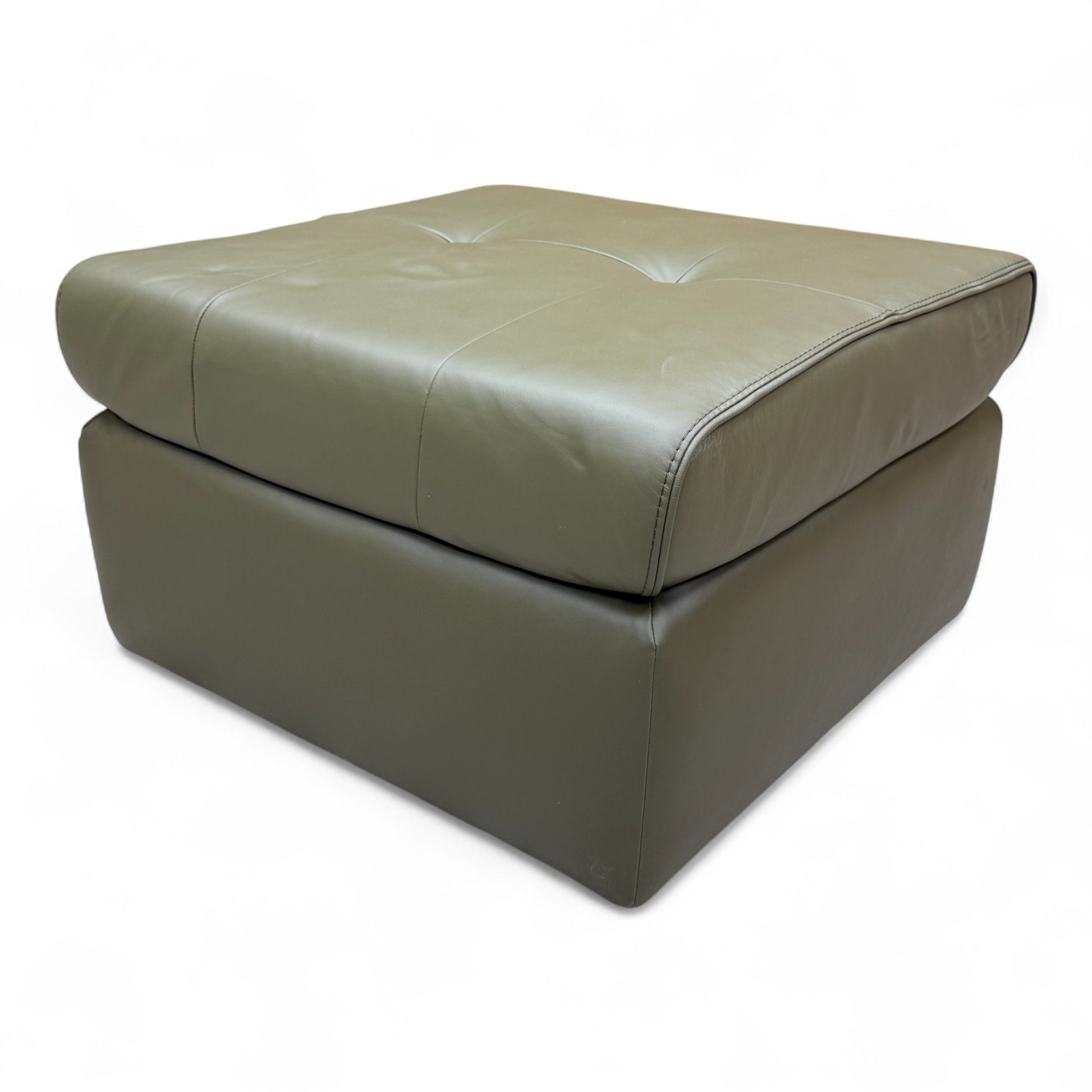 Fabb 'Ava' Large Square Footstool in khaki green leather, shown from an angle, highlighting its size and square shape.