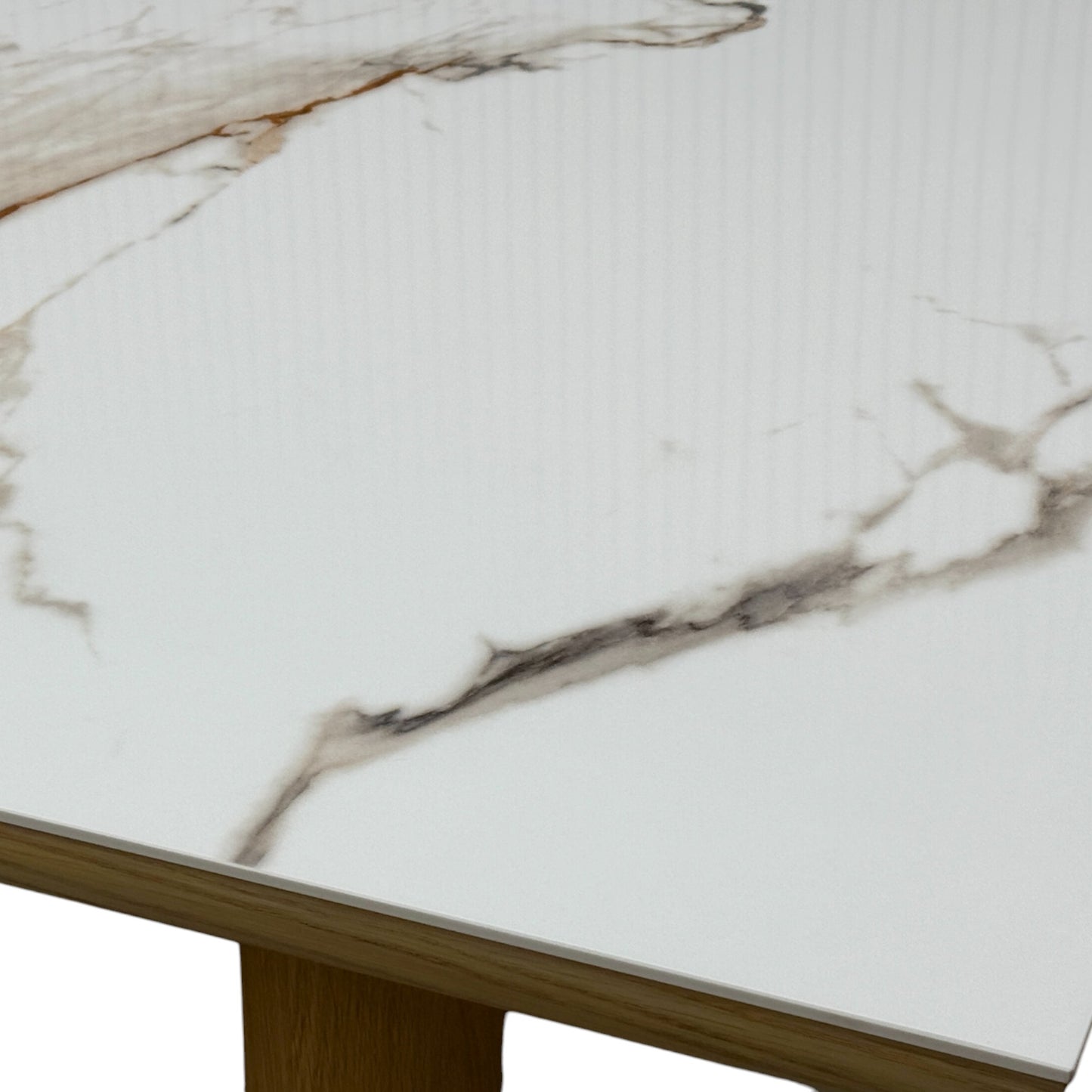 Detail of the large, solid oak legs of the 'Montreale' table, showing the natural wood grain and construction.