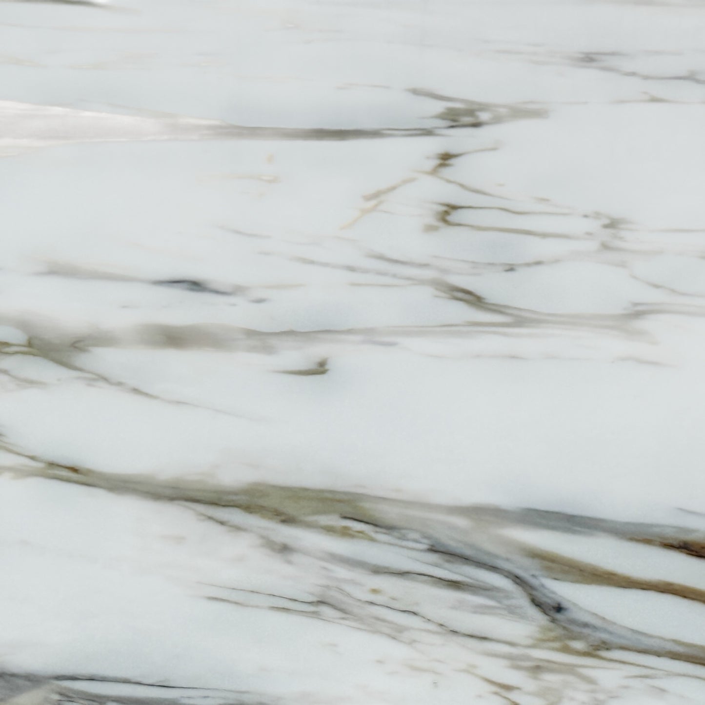 Detail of the 'Allegra' table's distinctive smoked oak base, highlighting the dark wood grain and modern leg design.