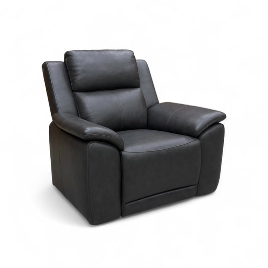 An angled side view of the armchair, highlighting the curved shape of the padded arms and backrest.
