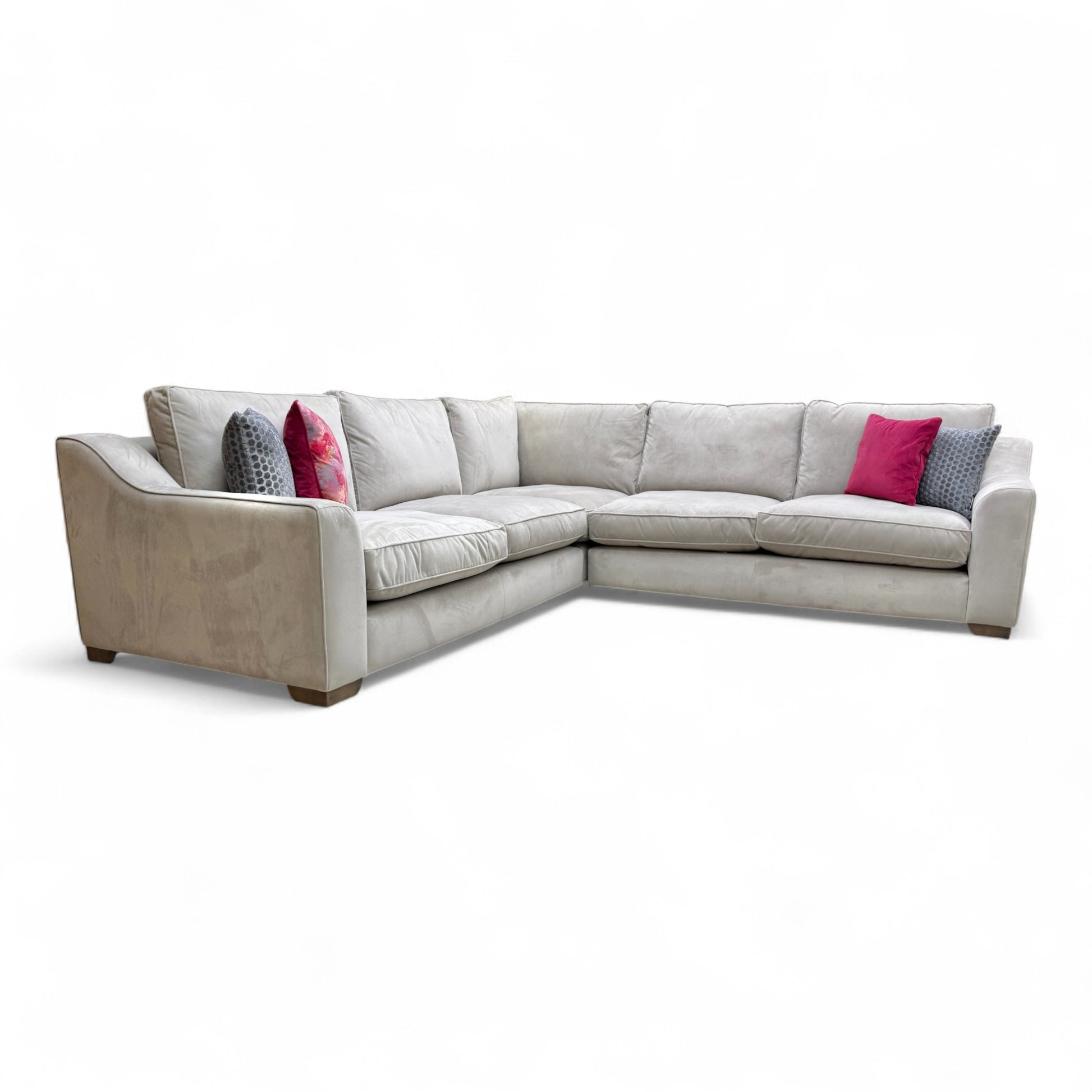A view of the back and side of the 'Isobel' corner sofa, showcasing its sophisticated silhouette and finished backing.