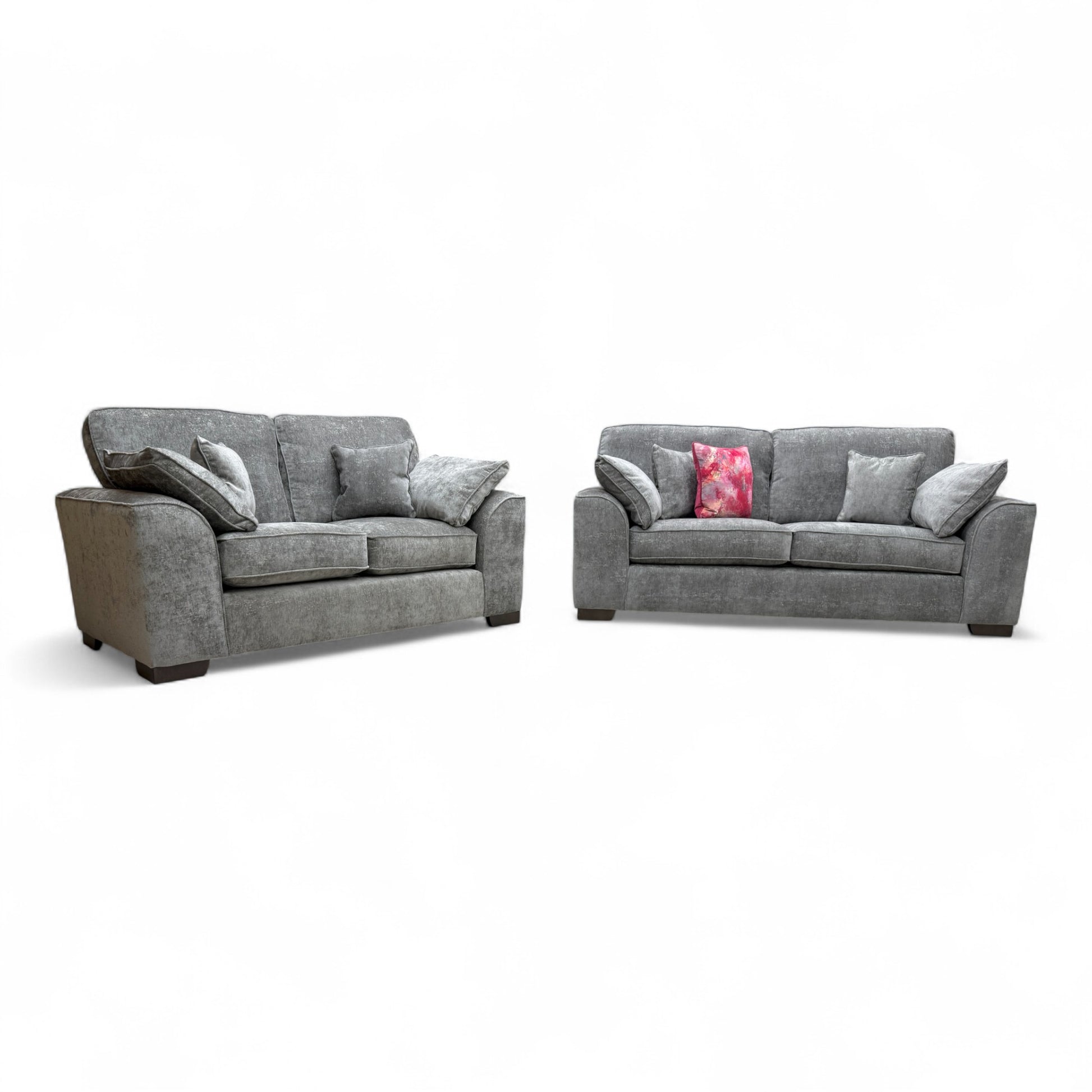 Angled view of the large 'Harvey' 3-seater sofa in charcoal grey chenille fabric, showing the modern cushion back and English arm style.